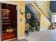 Entryway with elevator and staircase at 16301 Redington Dr, Redington Beach, FL 33708