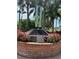 Brick memorial with glass pillars and plaque at 16301 Redington Dr, Redington Beach, FL 33708