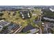 Aerial view of community near golf course and water at 200 Country Club Dr # 802, Largo, FL 33771