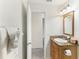 Updated bathroom with granite vanity and tiled shower/tub at 200 Country Club Dr # 802, Largo, FL 33771