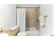 Simple bathroom featuring a shower/tub combo and granite countertop at 200 Country Club Dr # 802, Largo, FL 33771