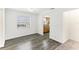 Open dining area with wood-look floors, adjacent to the kitchen at 200 Country Club Dr # 802, Largo, FL 33771