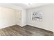 Bright living room with hardwood floors and a view of the entrance at 200 Country Club Dr # 802, Largo, FL 33771