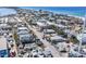 Picturesque aerial view highlighting the waterfront community and sandy beach at 206 Church Ave, Bradenton Beach, FL 34217