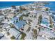 Stunning aerial view showcasing the beach neighborhood, surrounding homes, and the ocean at 206 Church Ave, Bradenton Beach, FL 34217