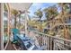 Tranquil balcony space with lush trees surrounding the residence at 206 Church Ave, Bradenton Beach, FL 34217