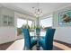 Bright dining area with ocean views and seating for four at 206 Church Ave, Bradenton Beach, FL 34217