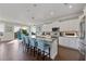 Open concept kitchen with granite island and breakfast bar at 206 Church Ave, Bradenton Beach, FL 34217