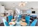 Open-concept living area with adjacent dining area and kitchen at 206 Church Ave, Bradenton Beach, FL 34217