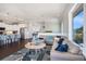 Open concept living room that flows into the kitchen with modern appliances and ample counter space at 206 Church Ave, Bradenton Beach, FL 34217