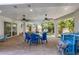 Covered patio with seating area and pool view, great for outdoor dining at 206 Church Ave, Bradenton Beach, FL 34217