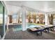 Relaxing outdoor pool and spa area with stone pavers and comfortable lounge chairs at 206 Church Ave, Bradenton Beach, FL 34217