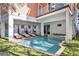 Refreshing pool and spa with a covered patio, ideal for outdoor entertaining and relaxation at 206 Church Ave, Bradenton Beach, FL 34217
