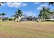 Large backyard with a screened-in pool and gazebo at 214 Bon Vie Pl, Valrico, FL 33594