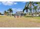 Large backyard with a screened-in pool and gazebo at 214 Bon Vie Pl, Valrico, FL 33594