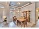 Bright dining room with hardwood floors and a chandelier at 214 Bon Vie Pl, Valrico, FL 33594