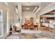 Elegant dining room with hardwood floors and a chandelier at 214 Bon Vie Pl, Valrico, FL 33594