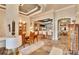 Elegant dining room with view of kitchen and Gathering room at 214 Bon Vie Pl, Valrico, FL 33594