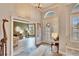 Bright and spacious entryway with views into the living room at 214 Bon Vie Pl, Valrico, FL 33594