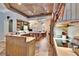 Open concept kitchen with island and custom cabinetry at 214 Bon Vie Pl, Valrico, FL 33594
