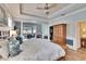 Bright main bedroom with wood flooring and ample closet space at 214 Bon Vie Pl, Valrico, FL 33594