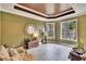 Cozy home office with large windows and hardwood floors at 214 Bon Vie Pl, Valrico, FL 33594