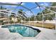 Enclosed pool and spa with a large screened patio area at 214 Bon Vie Pl, Valrico, FL 33594