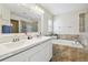 Double vanity bathroom with soaking tub and shower at 2424 Dakota Rock Dr, Ruskin, FL 33570