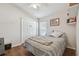 Bedroom with a double bed, wood floors, and closet at 2424 Dakota Rock Dr, Ruskin, FL 33570