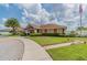 Community building with solar panels and landscaping at 2424 Dakota Rock Dr, Ruskin, FL 33570