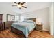 Spacious main bedroom with wood flooring and dresser at 2424 Dakota Rock Dr, Ruskin, FL 33570
