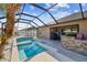 Relaxing pool and spa with screened enclosure at 2424 Dakota Rock Dr, Ruskin, FL 33570