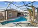 Inviting pool and spa with screened patio at 2424 Dakota Rock Dr, Ruskin, FL 33570