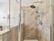 Large walk-in shower with tiled walls at 2424 Dakota Rock Dr, Ruskin, FL 33570