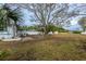 Spacious backyard featuring a large tree and home view at 2744 45Th S St, Gulfport, FL 33711