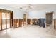 Under renovation: A bedroom with exposed framing and new flooring at 2744 45Th S St, Gulfport, FL 33711