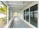 Spacious screened porch with water view, ideal for relaxing and enjoying the scenery at 2744 45Th S St, Gulfport, FL 33711