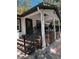 House with a covered porch, steps, and metal railing at 3005 E 148Th Ave, Lutz, FL 33559