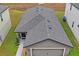Roof of a one-story house with a two-car garage at 30148 Fedora Cir, Brooksville, FL 34602