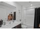 Clean bathroom with bathtub, vanity, and shower at 30148 Fedora Cir, Brooksville, FL 34602