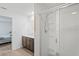 Bathroom with vanity, sink, and large shower at 30148 Fedora Cir, Brooksville, FL 34602
