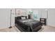 Cozy bedroom with plush bedding and modern dresser at 30148 Fedora Cir, Brooksville, FL 34602