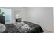 Bright bedroom with a comfortable bed and window coverings at 30148 Fedora Cir, Brooksville, FL 34602