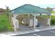 Community mailboxes sheltered under a covered structure at 30148 Fedora Cir, Brooksville, FL 34602