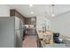 Modern kitchen with stainless steel appliances and granite countertops at 30148 Fedora Cir, Brooksville, FL 34602