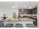 Modern kitchen with stainless steel appliances and granite countertops at 30148 Fedora Cir, Brooksville, FL 34602