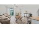Living room with hardwood floors and access to the patio at 30148 Fedora Cir, Brooksville, FL 34602
