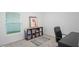 Home office with desk, chair, and built-in shelving at 30148 Fedora Cir, Brooksville, FL 34602