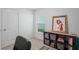 Bright home office with a desk, chair, and storage at 30148 Fedora Cir, Brooksville, FL 34602