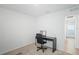 Simple home office with a desk and chair at 30148 Fedora Cir, Brooksville, FL 34602